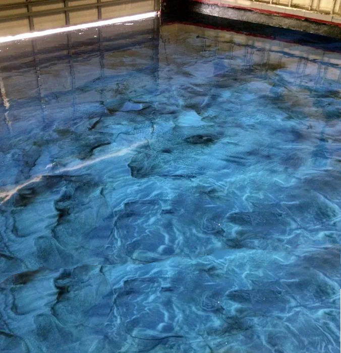 an image od a concrete overlay a blue marble patern it looks really good, colorful and rich