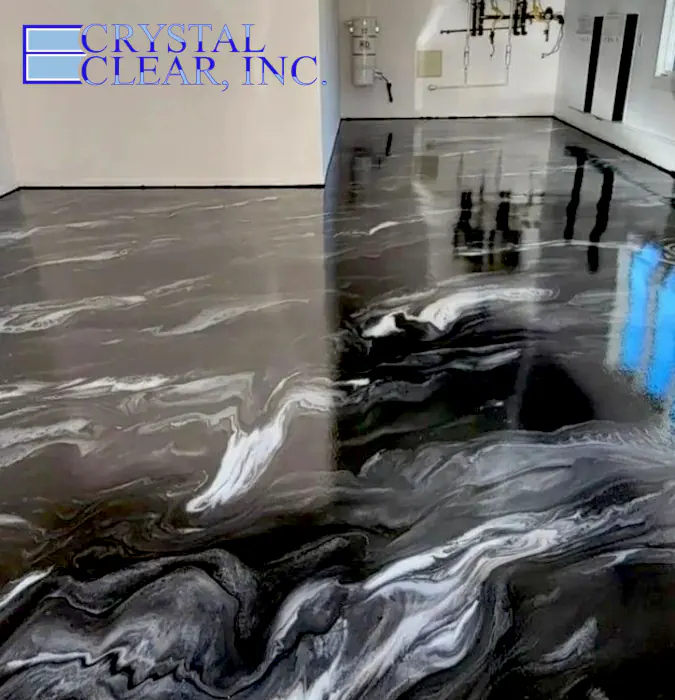 an image of a epoxy resin garage floor in a mabled look of black and white it looks stunningly beautiful