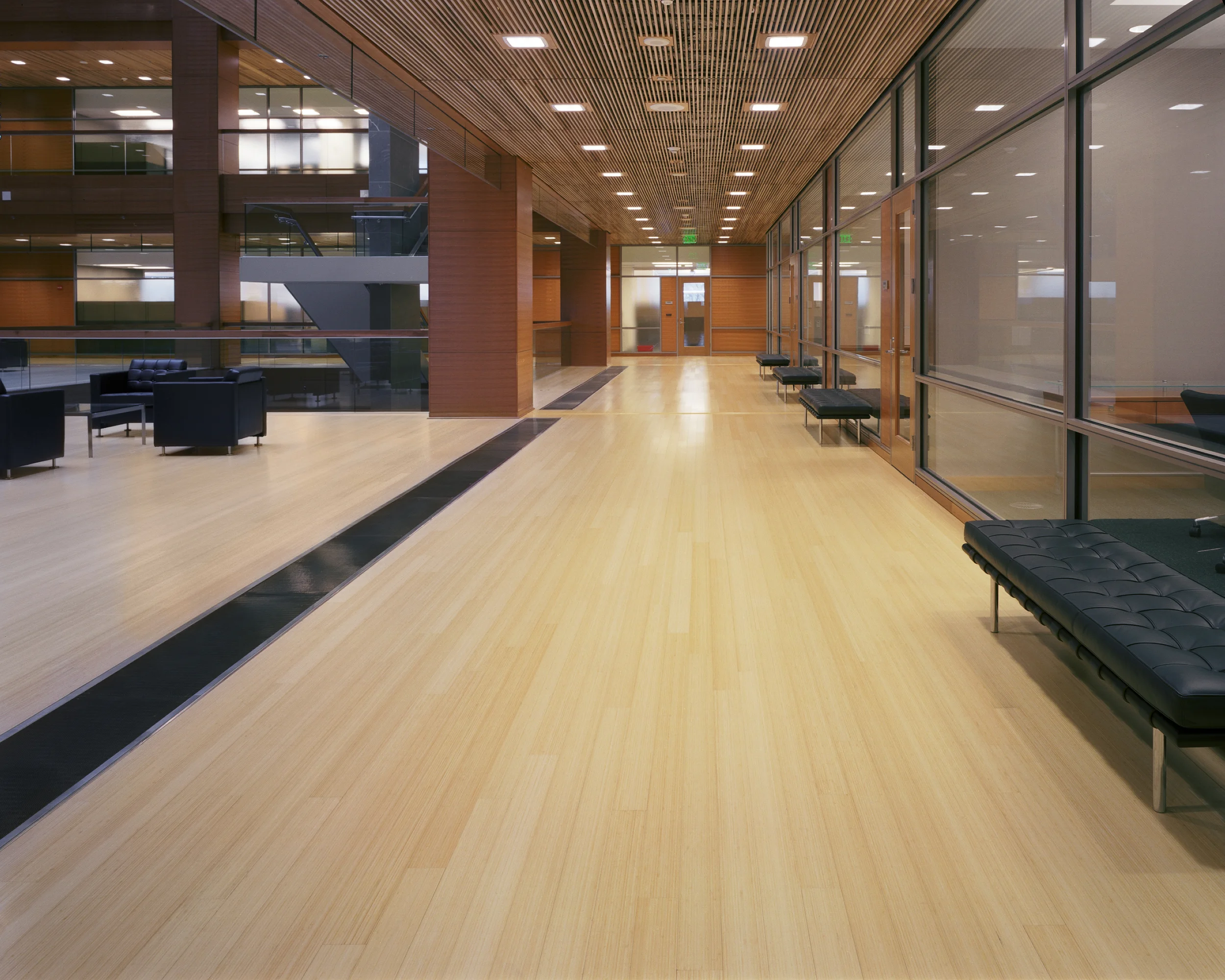 an image of Commercial-Floor-Services in an office setting it looks very large and modern, the floor is an off white, semi glossy